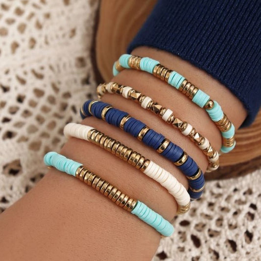 Heishi boho clay disck beaded bracelet set of five in shades of blue and gold