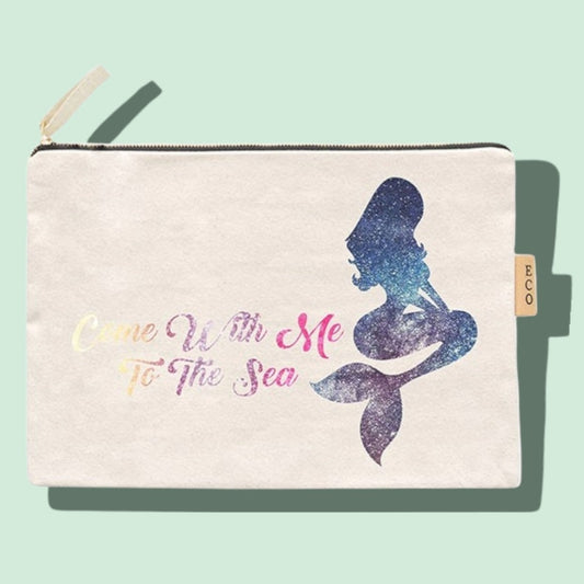 mermaid canvas pouch that says come with me to the sea and has a mermaid print on it
